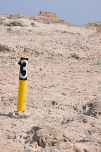 Trail marker in the Badlands designed to help people make good decisions regarding their safety.